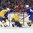 BUFFALO, NEW YORK - JANUARY 4: Sweden's Filip Gustavsson #30 makes the save while Kieffer Bellows #23 battles with Linus Hogberg #6 and Ryan Poehling #4 battles with Rasmus Dahlin #8 during semifinal round action at the 2018 IIHF World Junior Championship. (Photo by Matt Zambonin/HHOF-IIHF Images)

